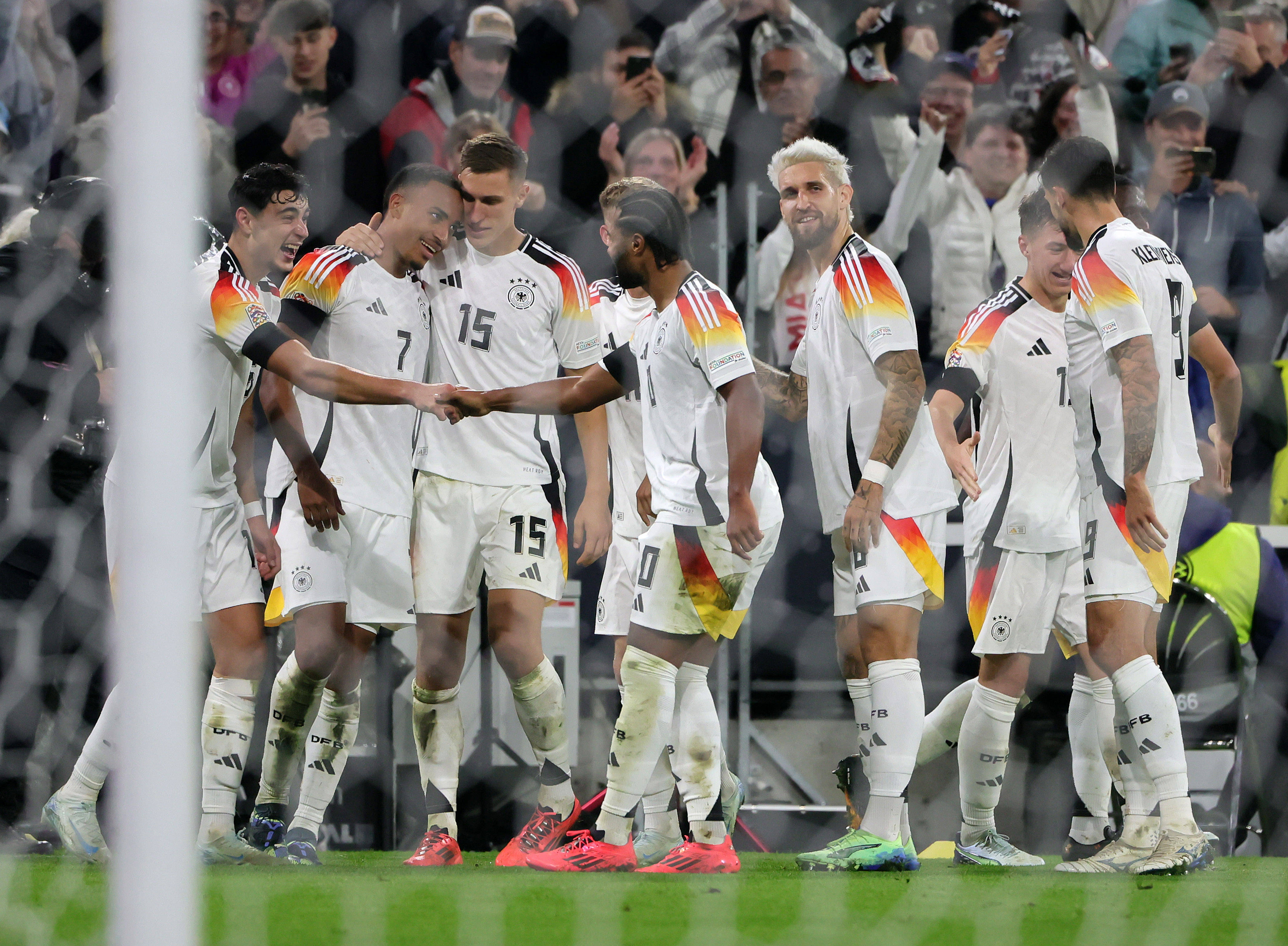 B体育体育vip注册-包含德国客场大胜挪威，提前晋级欧预赛的词条